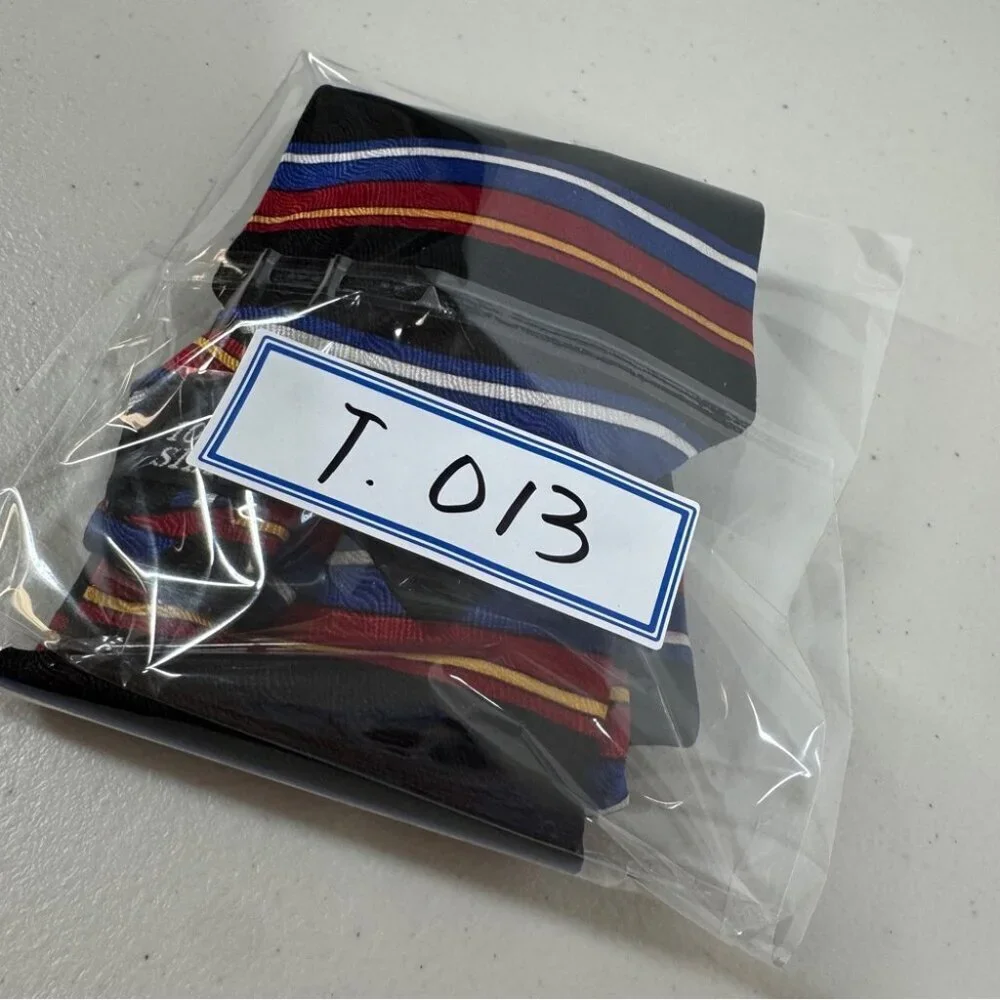 VTG Oscar de la Renta Striped Black Tie with Red and Blue Accents Textured